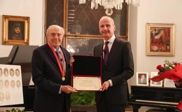 YUKSEL ERIMTAN RECEIVES THE GOLD MEDAL